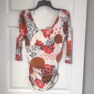 CAbi floral, rushing along sides and under bust.